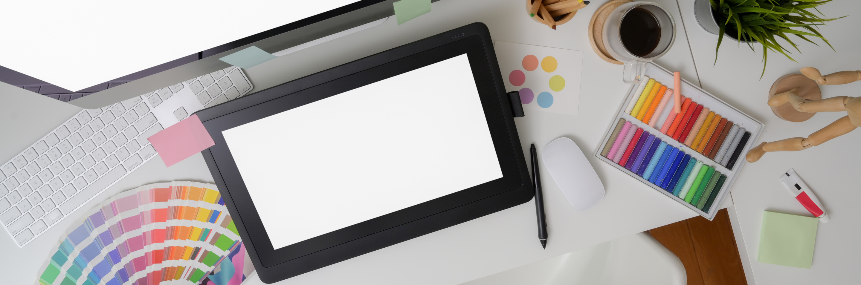 Top View of Graphic Designer Office Desk with Blank Screen Graph